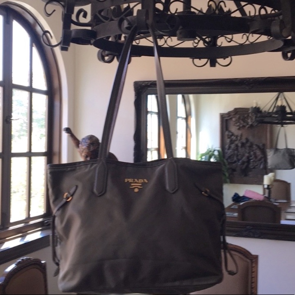 (Used) Prada tote. Dark green. Slight discoloration